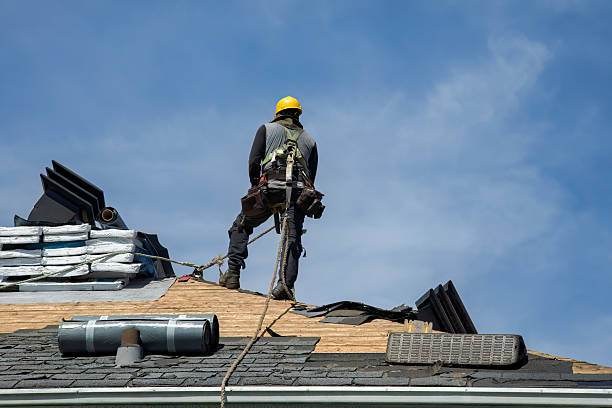 Professional Roof Replacement technician working in East Walpole, MA